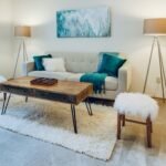 Soft and cosy living room decor with warm lighting and layered textures