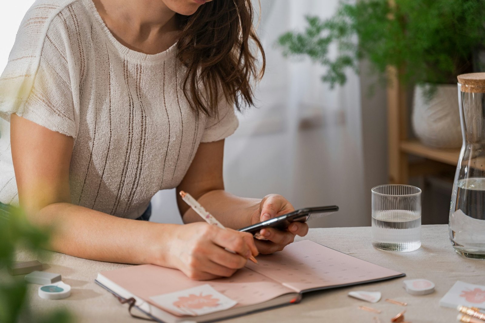 Woman planning her finances in a calm and cosy home setting