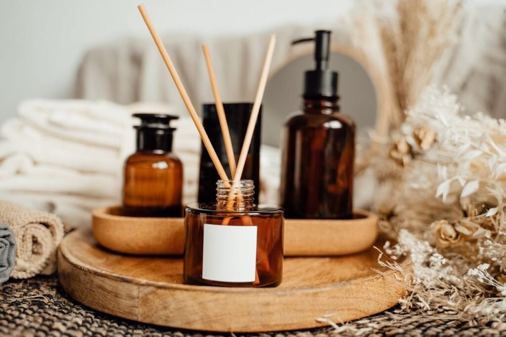 Aromatherapy arrangement with amber bottles and dried flowers for a fresh and calming home