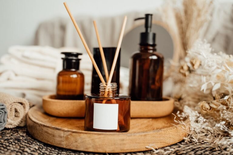 Aromatherapy arrangement with amber bottles and dried flowers for a fresh and calming home