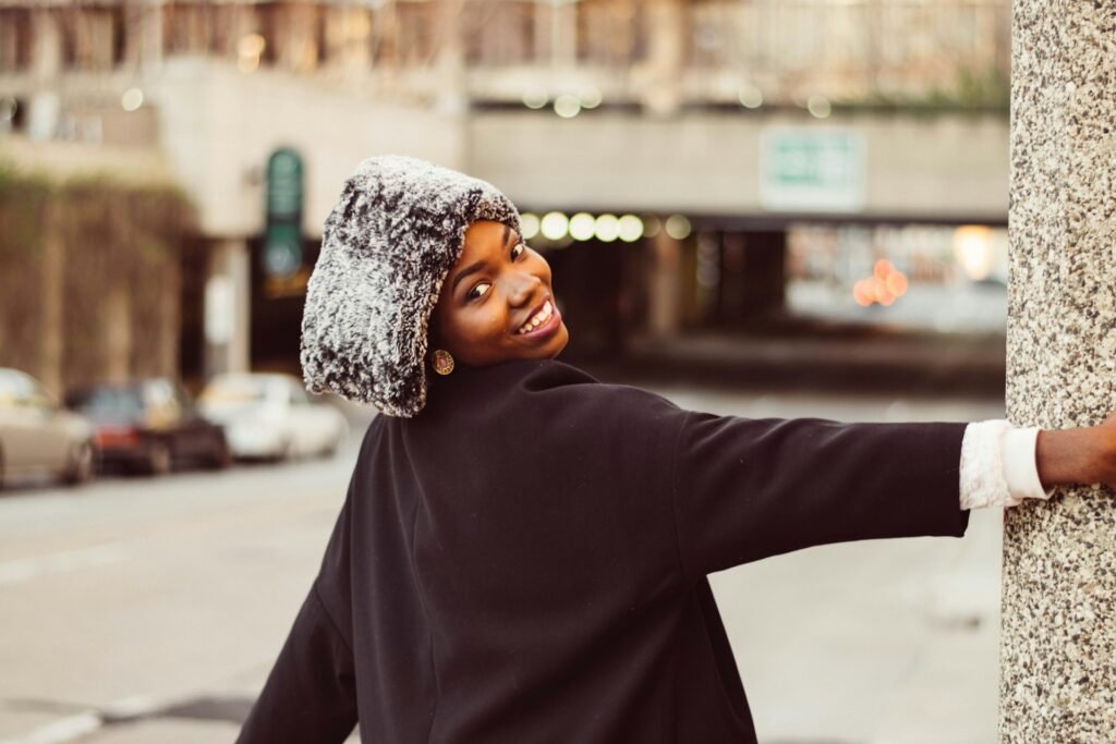 Girl in winter wear glowing skin cosy winter beauty routine South African winter beauty habits
